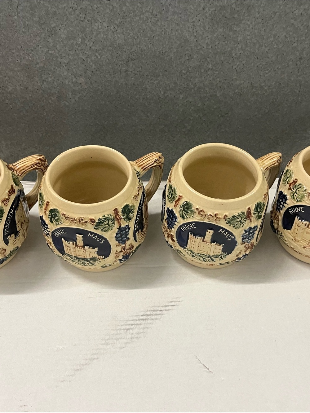 Decorative Cream Ceramic Stein Mug with Blue Castle Motif
